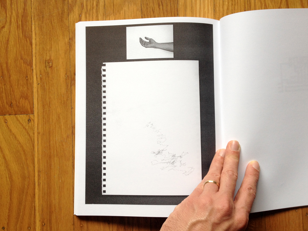 A book held open, images on left page showing a hand outstrecthed, palm up and empty, with corresponding gestural drawing